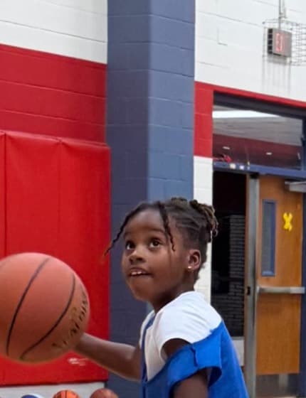 Jurnei Banks, 9, of The Colony, with a basketball. Photo courtesy of Charla Craddock